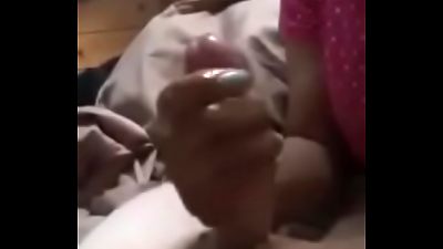 mom makes a handjob to her sonny before going to sleep