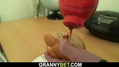 fellow picks up gigantic fun bags grandma in cafe