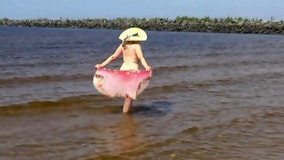 bare hot milf on a nude beach