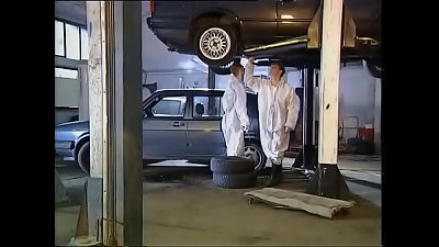 High class girl nailed by mechanics in garage